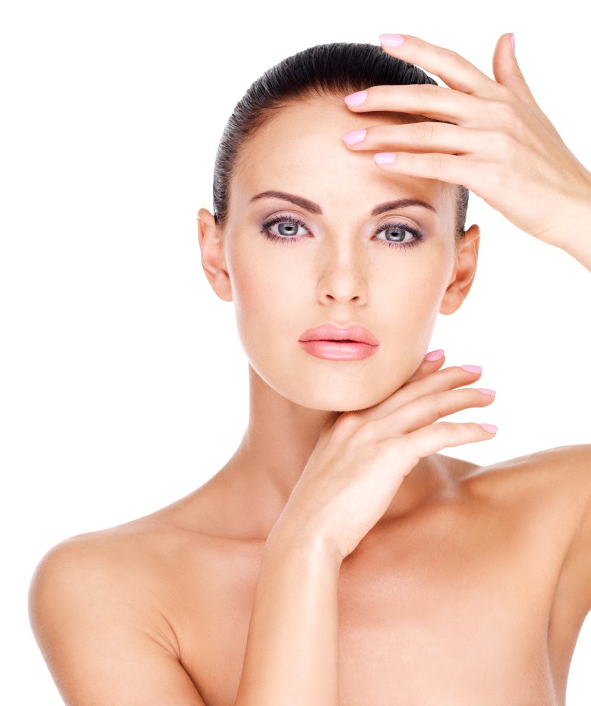 Beautiful healthy face of the young pretty white woman with fresh skin - isolated on white